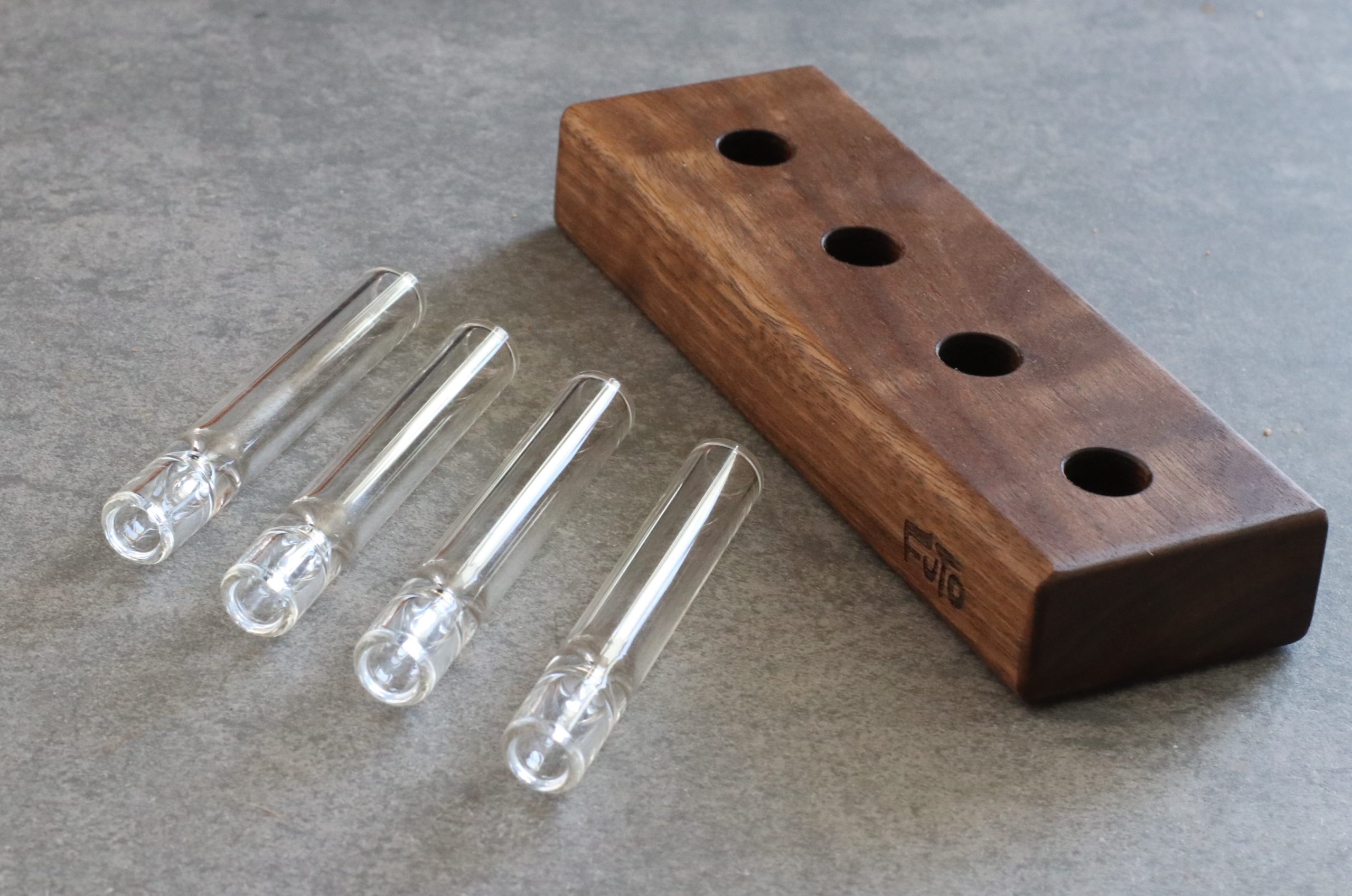 Buy a weed pipe made from wood, stone, metal or glass