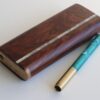 Wood Dugout & Brass Pipe